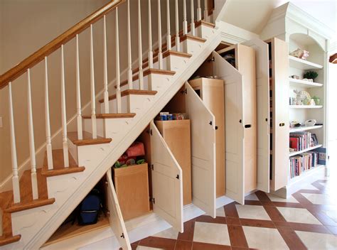 Make those stairs work double duty by mounting hooks to hang your outerwear. Cupboard Under the Stairs Arrangement - HomesFeed