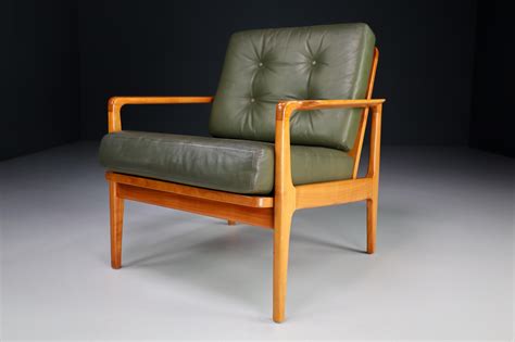 Midcentury Danish Lounge Chairs By Arne Wahl Iversen In Green Leather