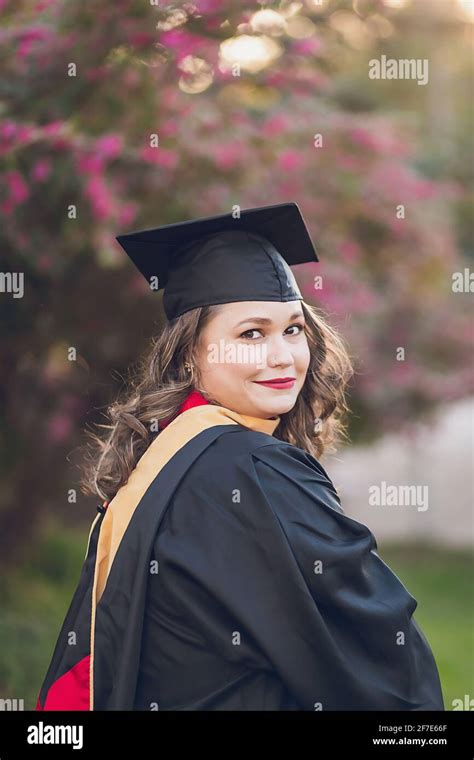 Graduation Black And Red Cap And Gown Hi Res Stock Photography And