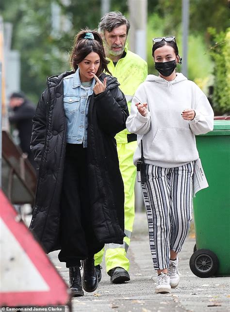 michelle keegan wraps up in a padded coat while filming scenes for brassic in