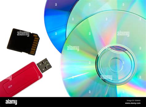 Cd And Dvd Disc A Memory Card And Flash Drive On White Background