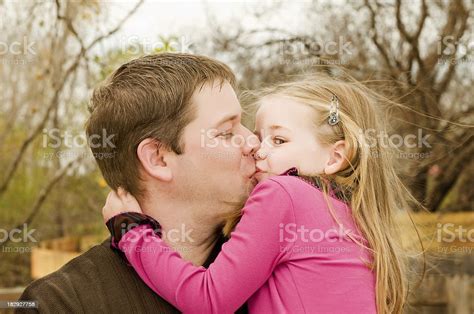 Daughter Kissing Dad Stock Photo And More Pictures Of Child Istock