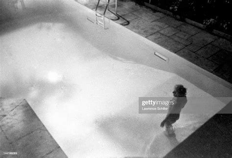 Apply American Actress Marilyn Monroe Steps Into A Pool For A Scene