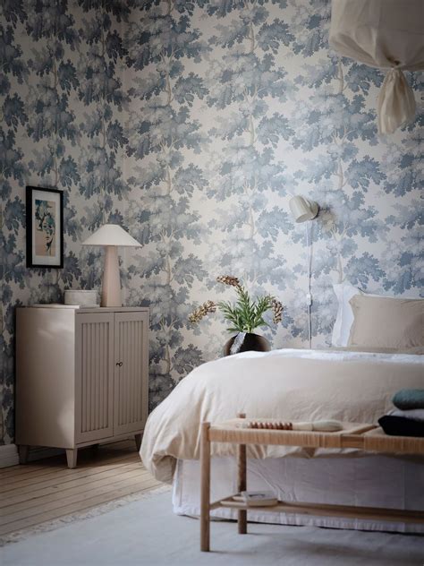 Bedroom With Eye Catching Blue Wall Paper Coco Lapine Design