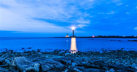 Lighthouse On Blue Night