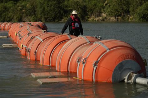 A Judge Orders Texas To Move A Floating Barrier Thats Used To Deter Migrants Between Us And