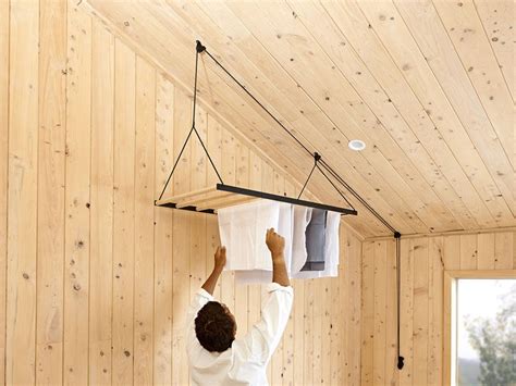 Our hand made timber rack is suspended on pulleys from the ceiling. This Hanging Clothes Drying Rack Can Be Raised And Lowered ...
