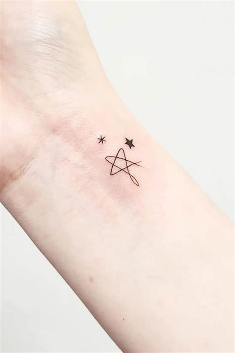 A Small Star Tattoo On The Wrist