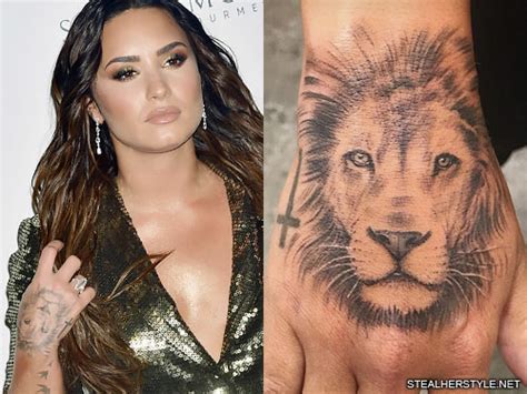 If there's one celebrity that's on top of the tattoo game, that's demi lovato and it looks she just added a new design to her neck. Demi Lovato Lion Back of Hand Tattoo | Steal Her Style