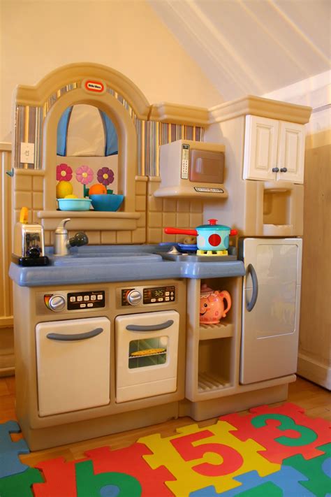 I looked at all different types of kitchens for my daughter's 2nd birthday gift. Little Tikes Kitchen - home design help