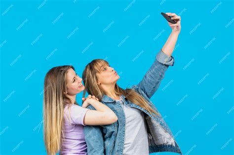 Free Photo Beautiful Women Taking Selfies Together
