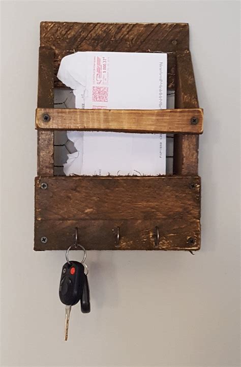 The rustic design will add a touch of style to your storage and complement your home decor. Mail and key holder- Rustic mail and key holder- Farmhouse ...