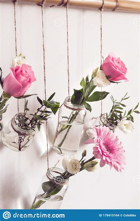 Reuse throw pillows, blankets, and linens. Old Glass Jars Are Reused As Flower Vases. DIY Home ...