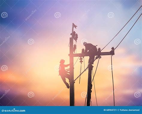 Silhouette Electrical Workers Are Installing High Voltage System Stock