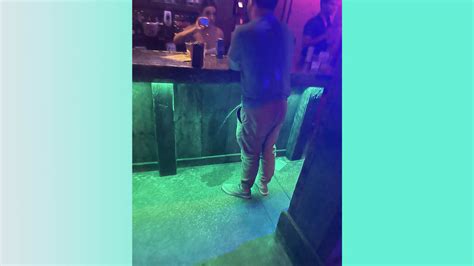 drunk guy pissing at bar know your meme