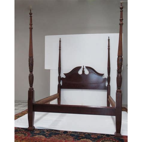 A bunkbed attached to the ceiling, this is genious. 1980s Vintage Colonial-Style Rice Carved 4-Poster Bed Attr. To Henkel Harris- Queen Size | Chairish