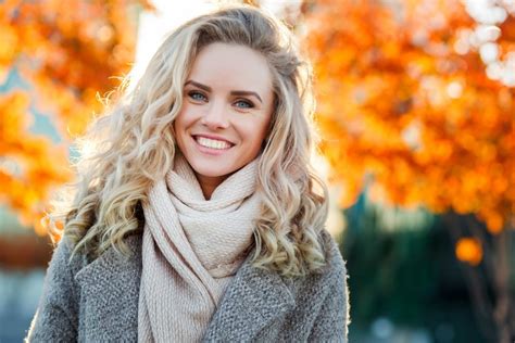 Beautiful Smiling Blond Woman With Curly Hair And Blue Eyes Ok Dental Expressions Blog