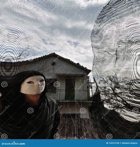 Masked Evil Figure Behind Threaded Window Stock Photo Image Of Fear