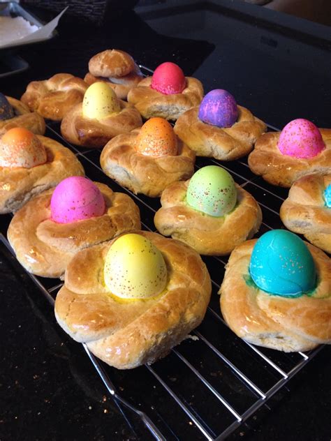 Coloured eggs are baked into the bread and the bread is sprinkled with lots of nonpareils. Italian Easter Egg Baskets