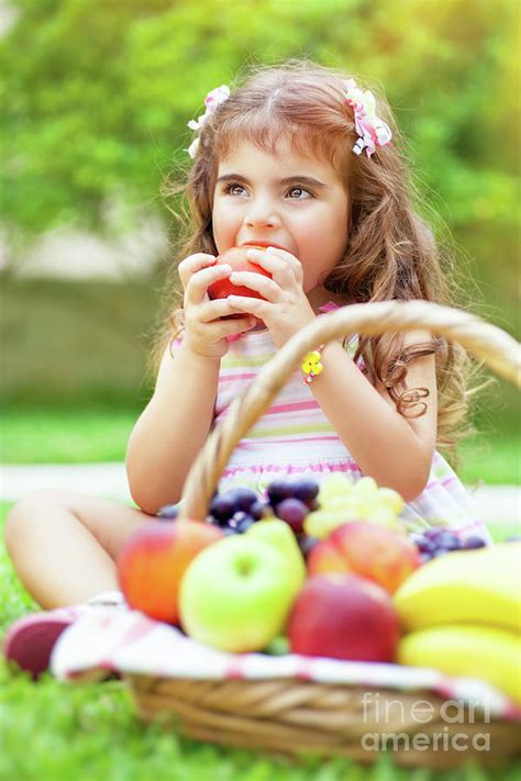 Little Girl Eating An Apple Photograph By Anna Om