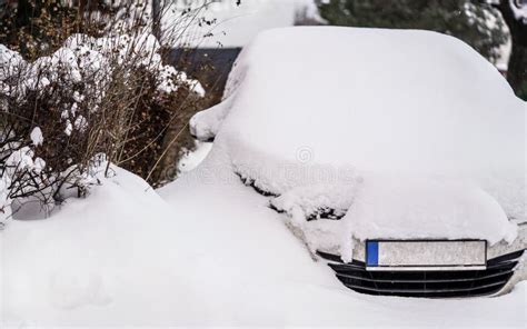 Car Covered Under Thick Layer Of Snow In Winter Stock Photo Image Of