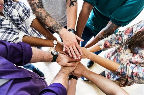 Group Of Diverse People Joined Hands Together Teamwork Stock Photo By