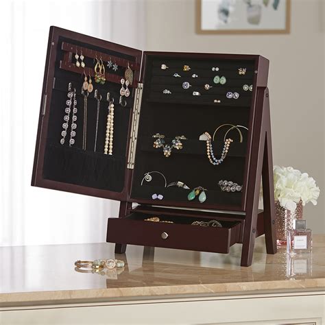 The Mirrored Tabletop Hidden Jewelry Cabinet Hammacher Schlemmer