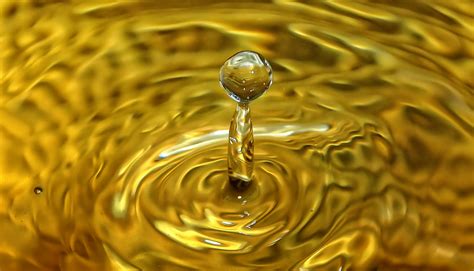 Liquid Gold Waterdrop In A Beaten Golden Vase Its What