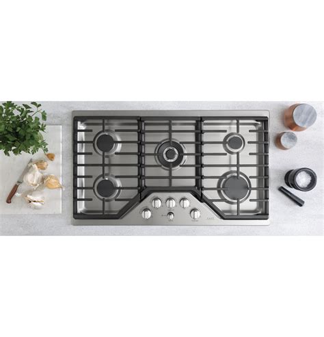 Maybe you would like to learn more about one of these? CGP95362MS1 Overview - Café™ 36" Gas Cooktop | Cafe Appliances