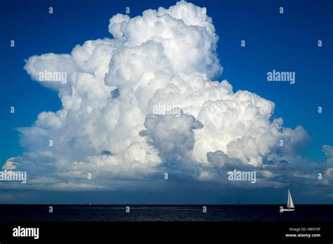 Beautiful Cumulus Cloud Over Ocean Weather And Travel Background Stock