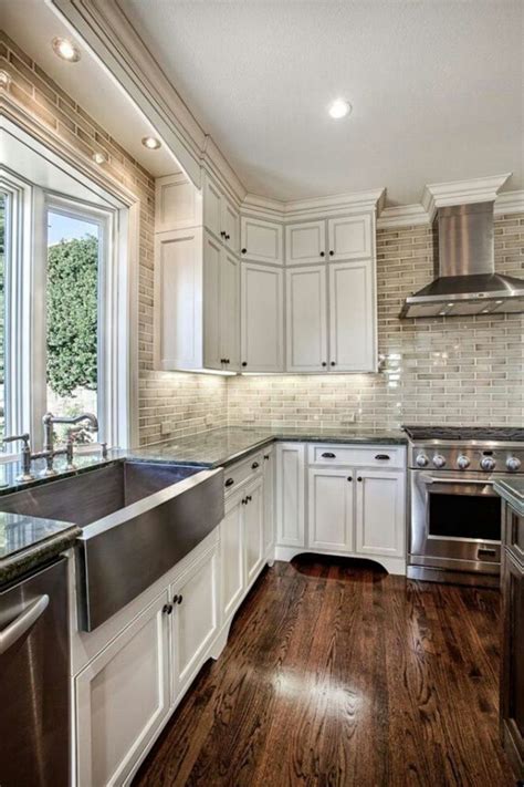 Quartz countertops are available in a wide variety of design and patterns. 70 Stunning Kitchen Light Cabinets with Dark Countertops ...