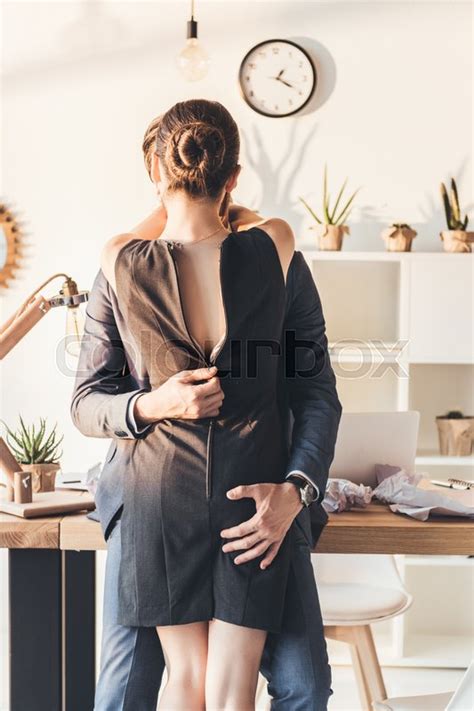 Man In A Suit Making Out With Woman And Stock Image Colourbox