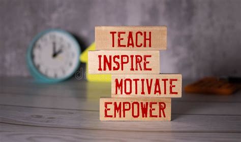 Teach Inspire Motivate Empower Text Words On Wooden Blocks Stock Image