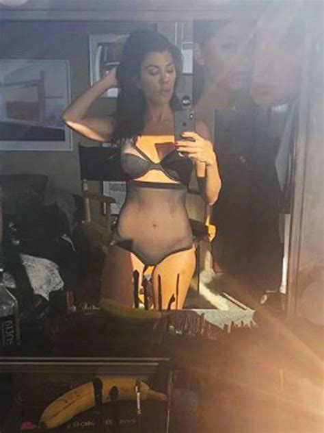 kourtney kardashian flashes cleavage in sheer underwear as she teases raunchy backstage shots