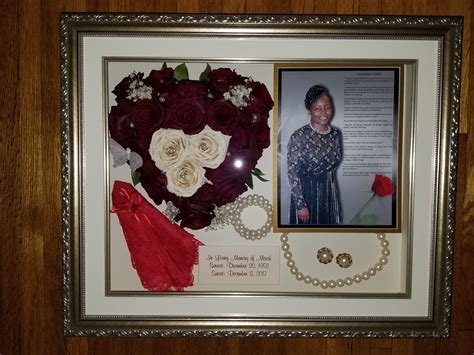 We preserved flowers from a funeral and designed them in a heart shape