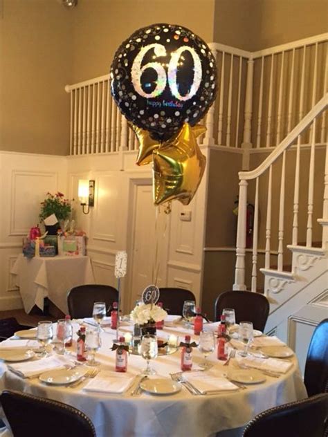 60th Birthday Party Centerpiece In Black And Gold Decorations In 2019