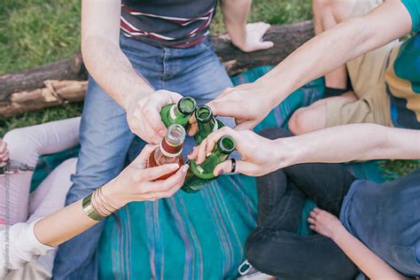 A Group Of Friends Making A Toast At The Park By Aleksandra Jankovic