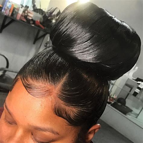 Laid edges can adorn just about any hairstyle. Bun on fleek! Find more styles and inspiration at ...