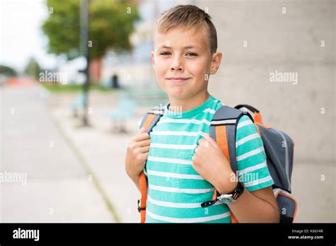 Pre Teen Boy Outside At School Stock Photo Alamy