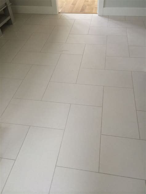 Time lapse installation of 24 x 12 porcelain floor tiles. 12x24 Tile In Herringbone Pattern With Sahara Beige Grout ...