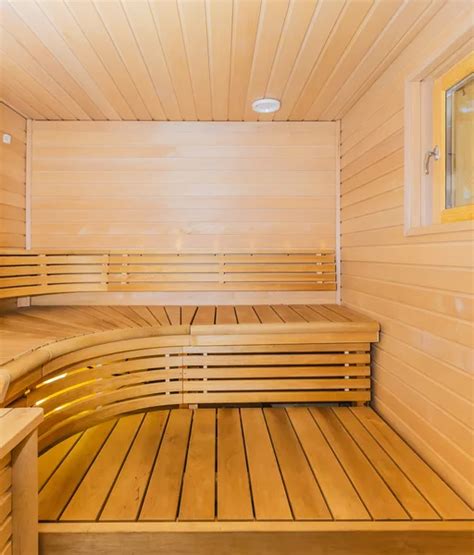 Empty Wooden Sauna Room With Ladle Bucket Ready To Be Used Stock Photo