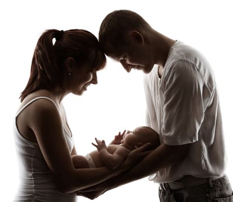 parents holding baby - Kofinas Perinatal