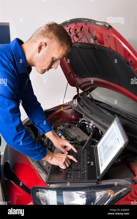 Mechanic Fixing Hi Res Stock Photography And Images Alamy