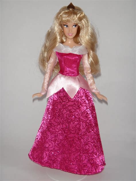 Aurora enjoys using her imagination and sharing stories with her forest friends. 2013 Classic Disney Princess Aurora 12'' Doll - Disney Sto ...