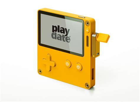 Playdate A Retro Yellow Crank Controlled Handheld Gaming System With A