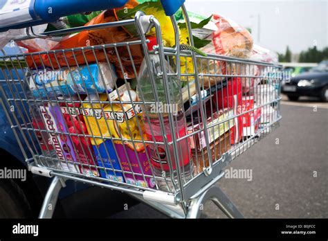 Supermarket Shopping Trolley Full Of Groceries Stock Photo Alamy