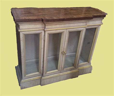 The impressive display features a stylish appeal and comes with a unique shelve design. Uhuru Furniture & Collectibles: Small Curio Cabinet - $95 ...