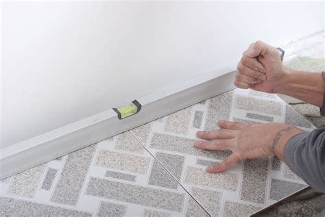 Glue wood to glass with silicone. Adhesive Floor Tiles vs. Self-Stick Tiles