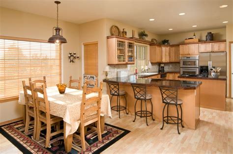 You have a kitchen and dining room and you want to consider creating one room that basically encompasses both spaces. Combining your kitchen and dining room - Yourwineyourway.com