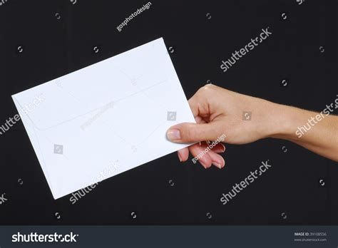 Young Woman Hand Holding Envelope Isolated Stock Photo 39108556